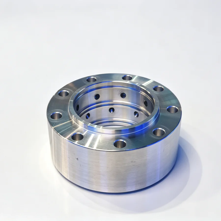 Machined bearing housing ring with flange and bolt circle after boring on a CNC lathe