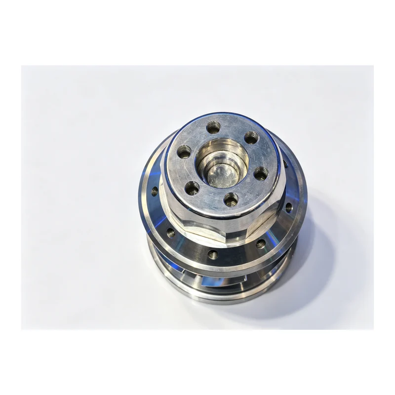 Machined cylinder end cap with a flange, bolt holes, and a central bore