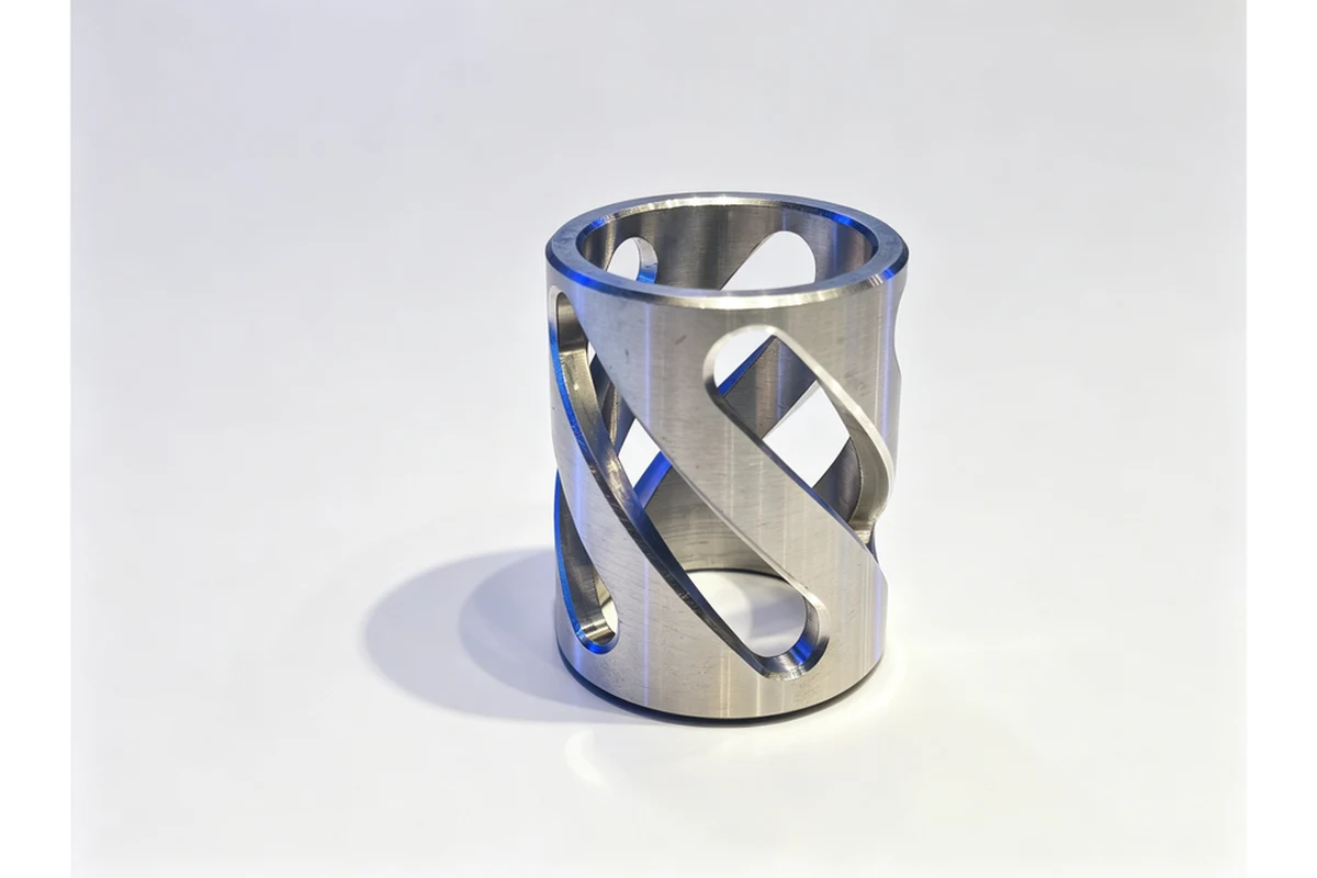 Machined slotted clamping sleeve with the bore and taper finished before the slots are cut