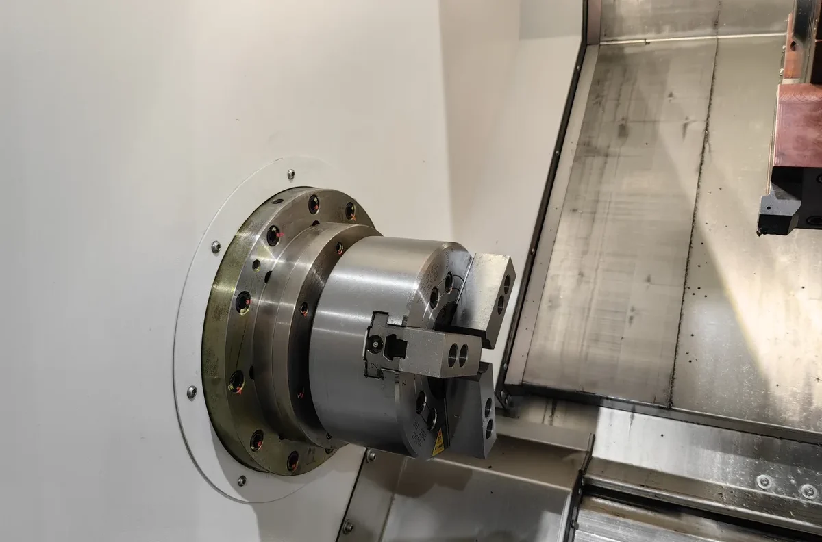 Working area of a CNC turning centre: chuck, turret and guideways