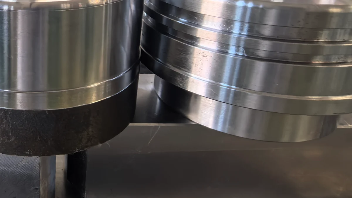 Machined hydraulic piston guide sleeves with a bright sliding bore, turned in one clamping