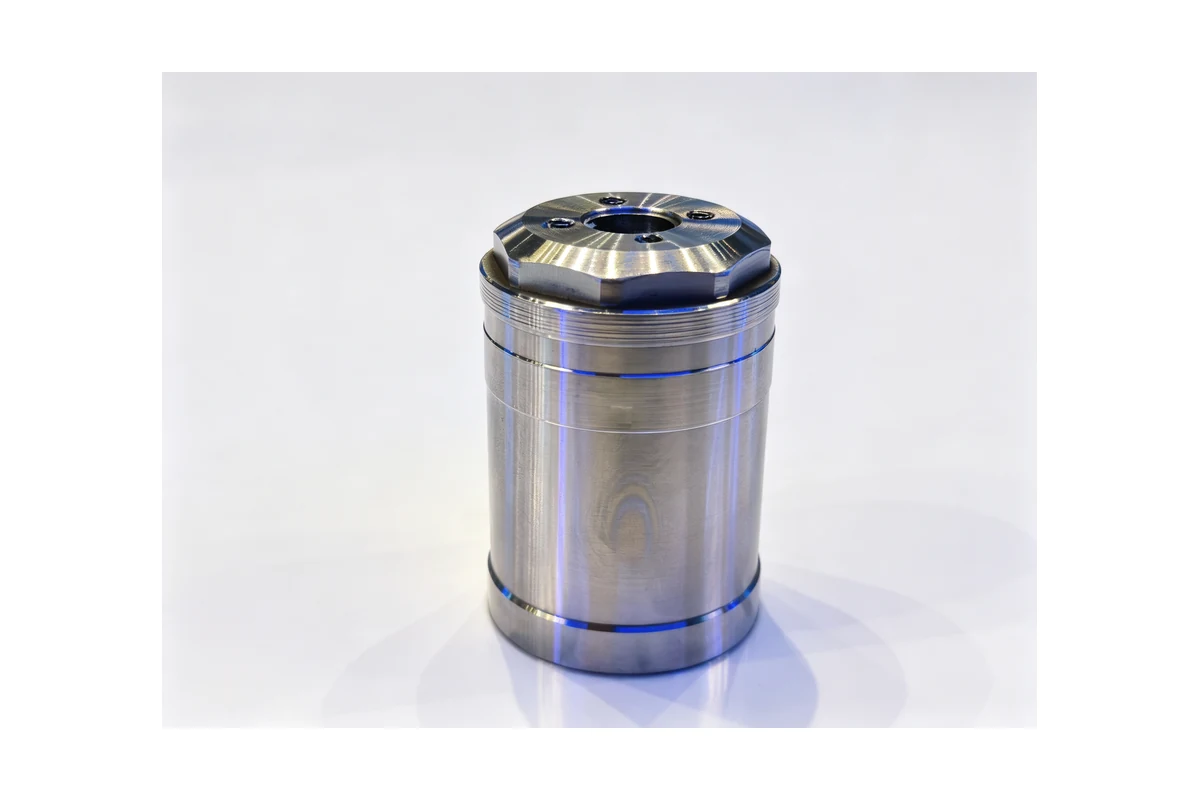 Stepped steel sleeve with bore and counterbore turned on a CNC lathe